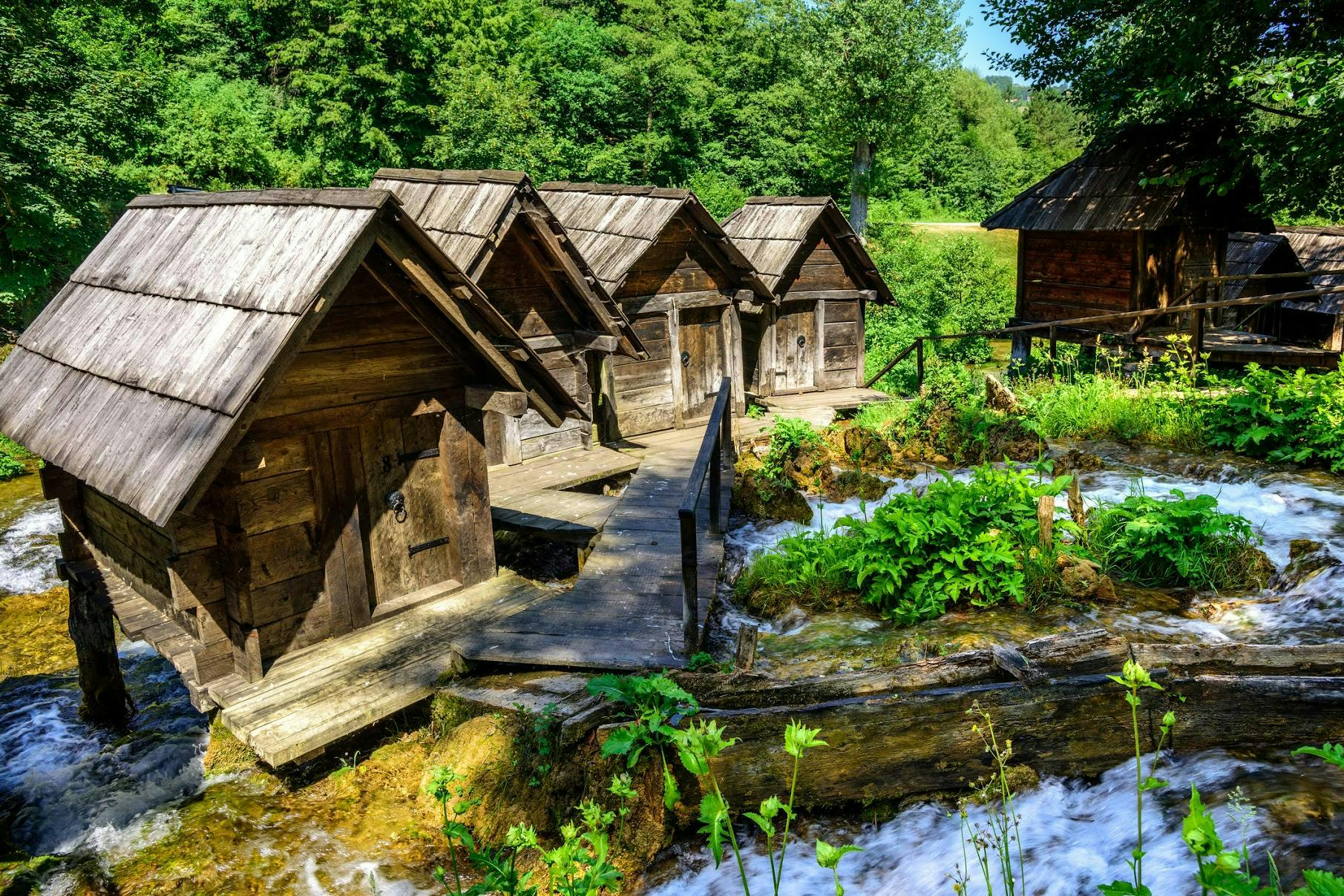 Wooden watermills on the lake. 