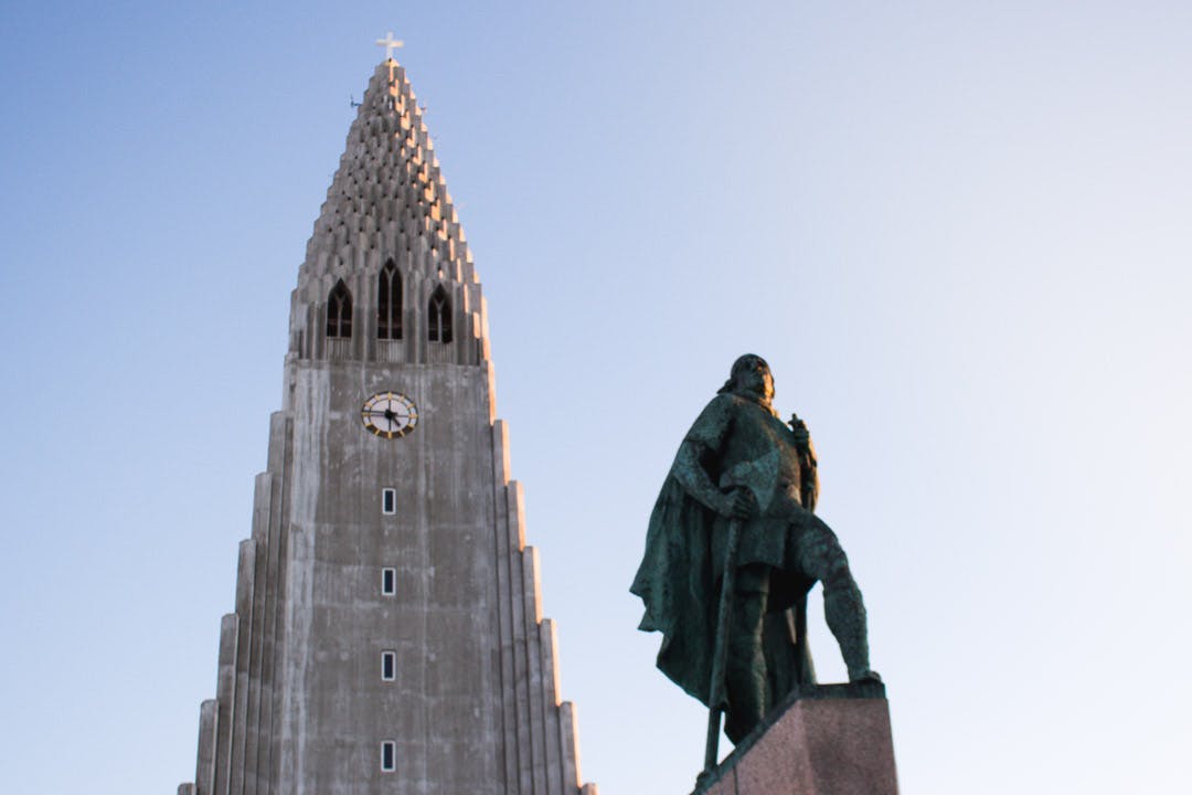Hallgrímskirkja churh in Iceland, with the statue of Leifur Eiríksson the explorer in the foreground. 