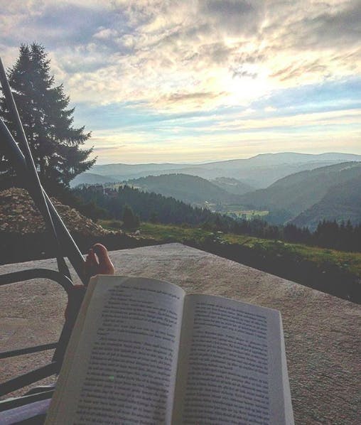 A open book, the readers toes and the view from Vlasic mountain. 
