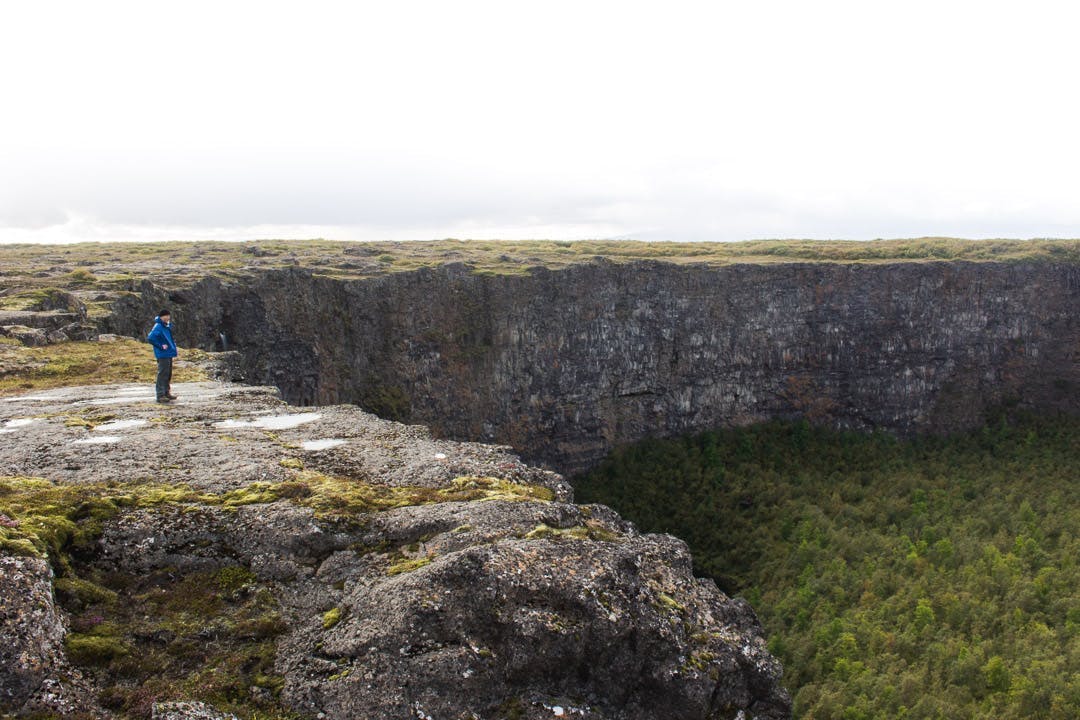 A hiker on top of Asbyrgi Canyon in the fall, Vatnajokull National Park
