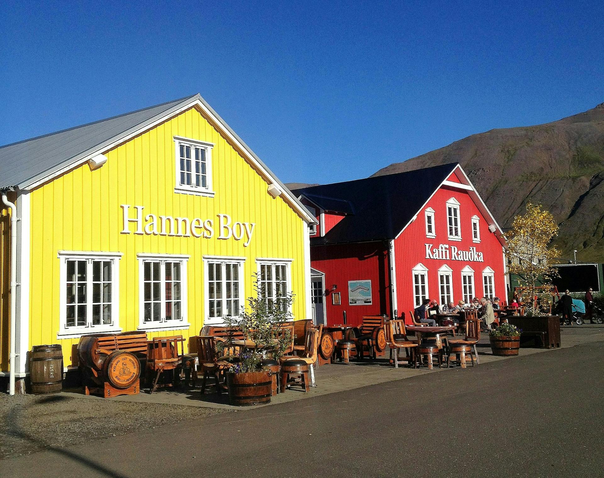 A yellow house (Hannes Boy) and red identical house (Kaffi Rauðka) in Siglufjörður