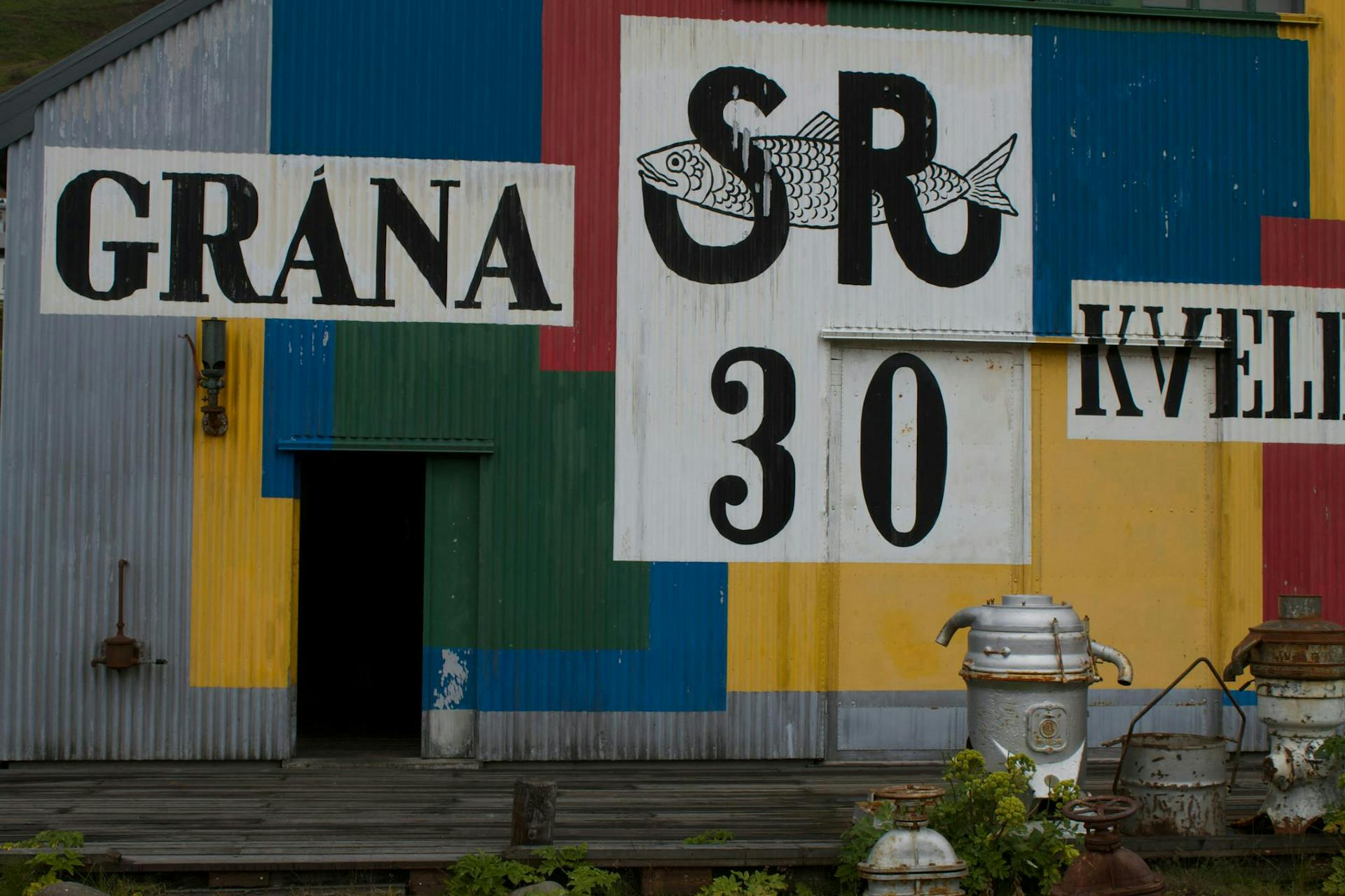 A colorful facade made of corrugated iron. 
