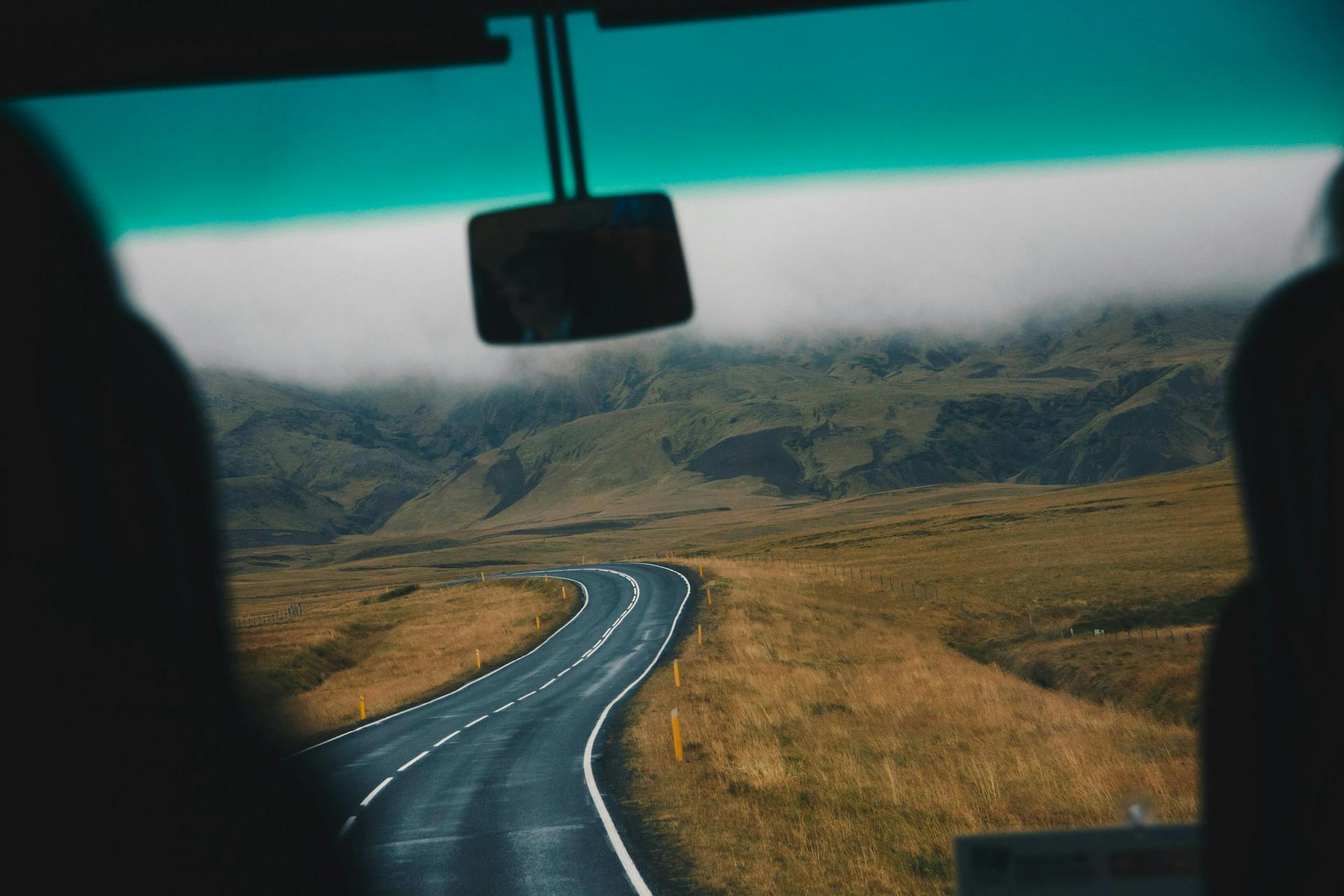 A road in Iceland seen from a car window. 