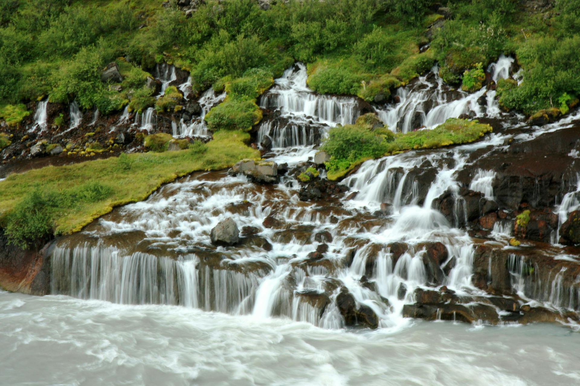 Hraunfossar waterfalls during the summer. 