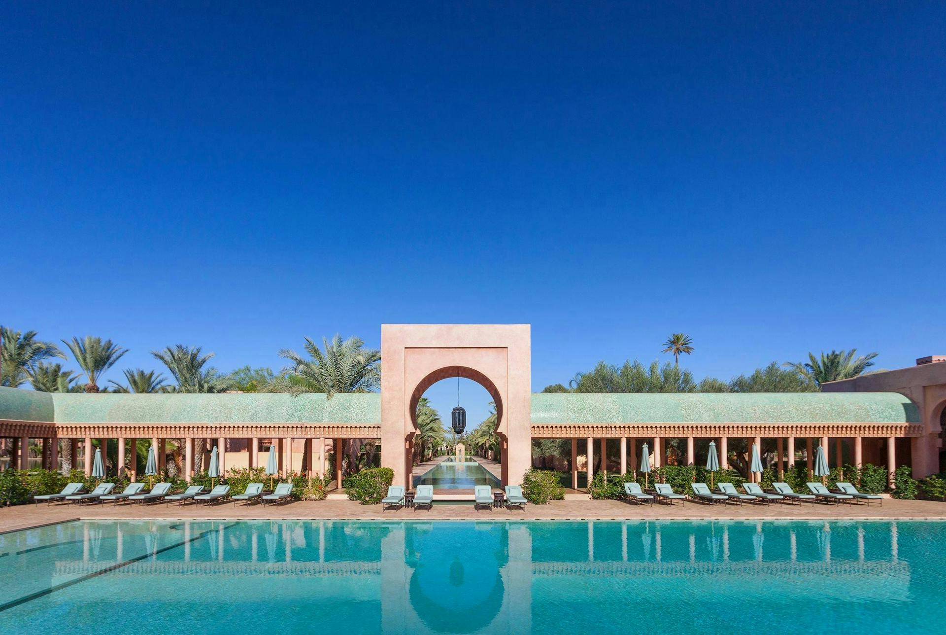 A serene swimming pool at a Moroccan resort. 