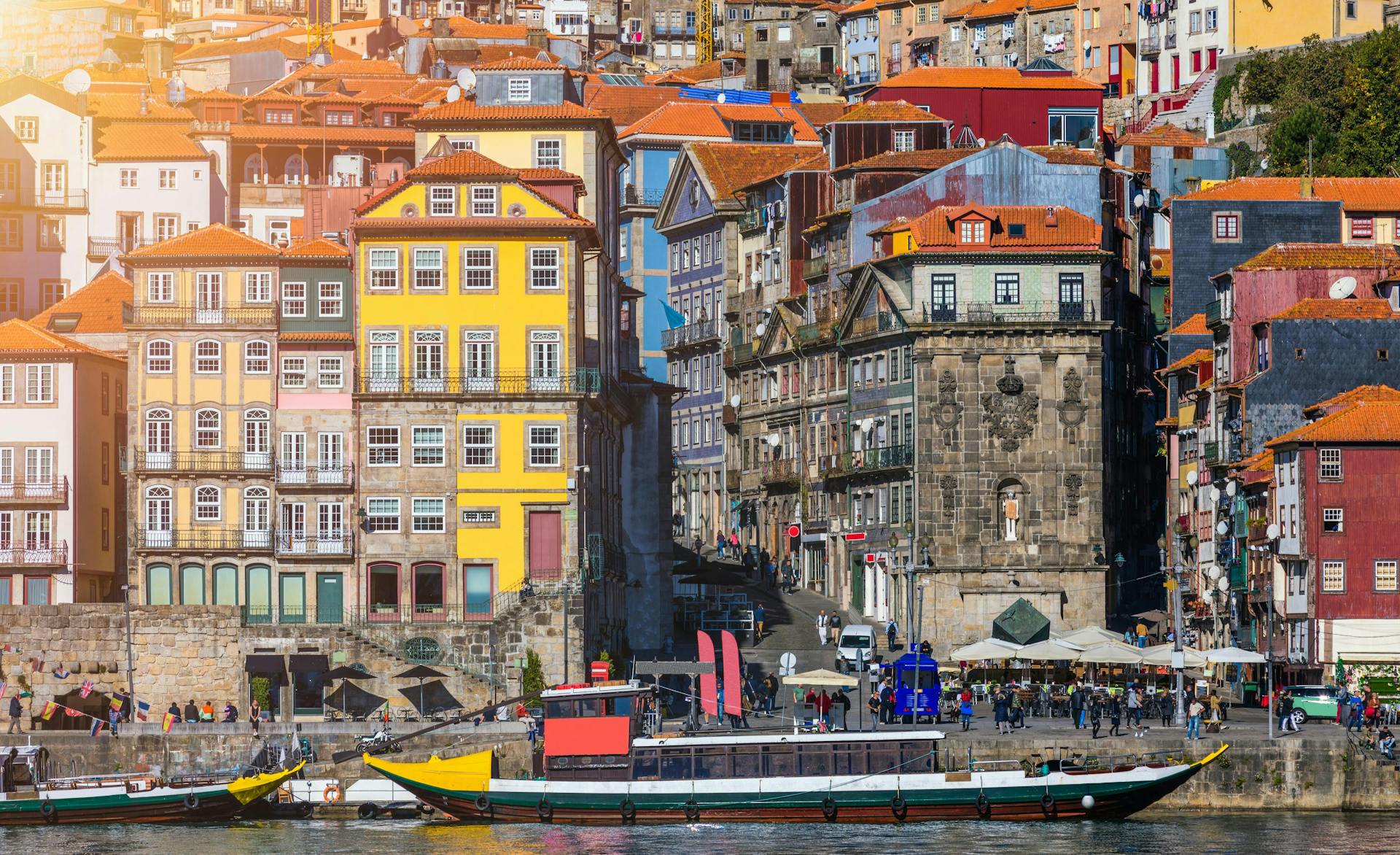 A scenic view of the Porto Old Town pier architecture over Duero river in Porto, Portugal.